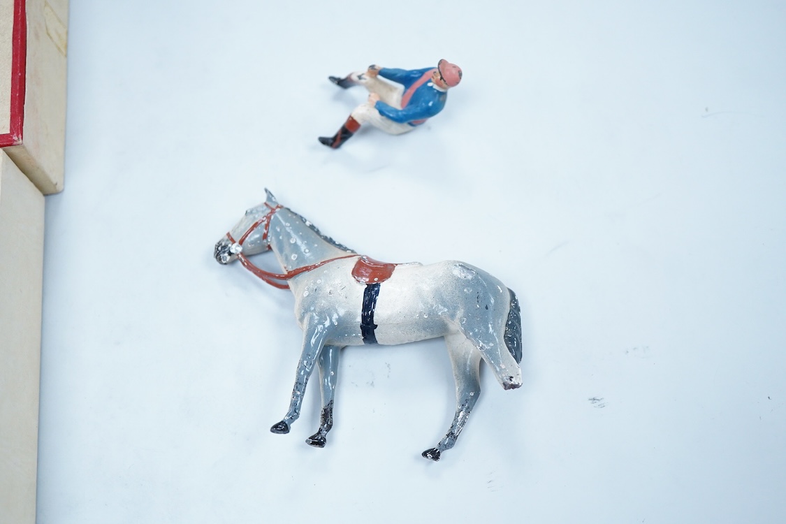 Two boxed Britains Racing Colours of Famous Owners series lead mounted figures; Lord Astor - rider in blue jersey with a pink sash on a grey horse (one leg broken and missing), and. the Duke of Norfolk - rider in blue je